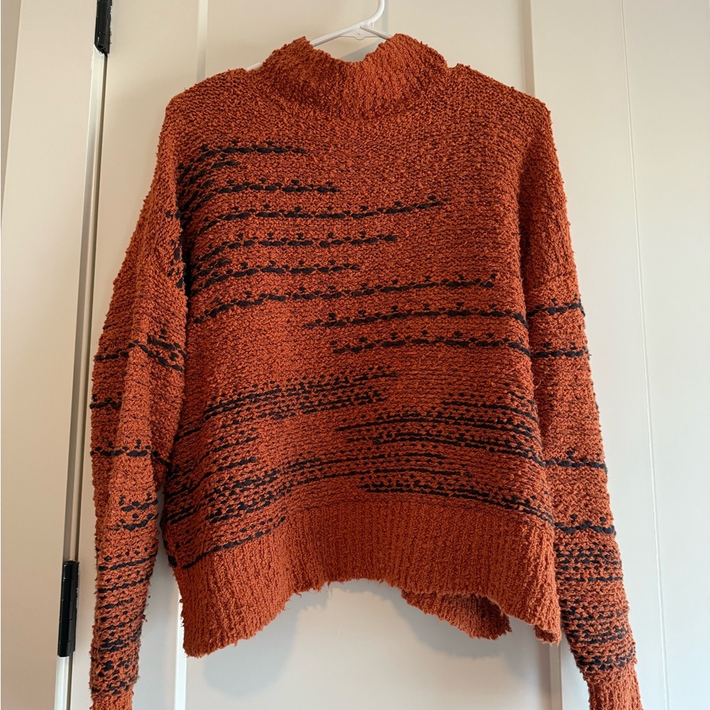 Cozy Orange Sweater with Black Accents